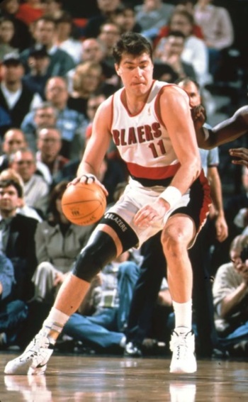 European Player Lithuanian Arvydas Sabonis on the court in action dribbling ball in his right hand