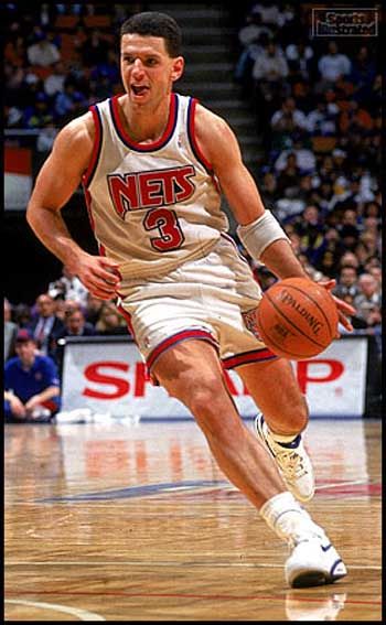 Croatian Drazen Petrovic on the court running dribbling ball on his left hand