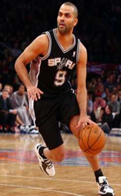 Photo of Tony Parker in action on court, running while dribbling the ball with his left hand